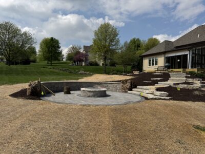 zoomed out view of a large backyard that has new grass seed installed by Carrington Lawn & Landscape in Madison, WI