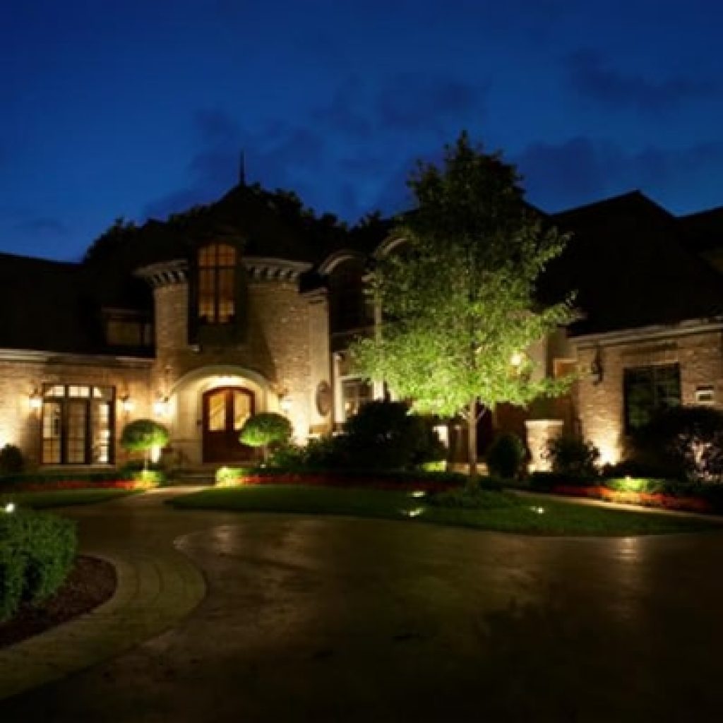 A large industrialized house with landscape lighting design in Middleton, WI.