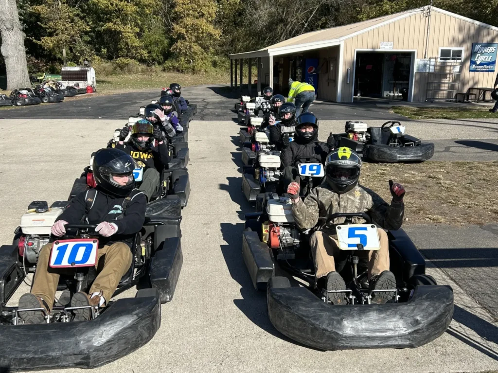 Carrington Lawn & Landscape employees line up in go-karts ready to race during a team-building activity in Madison