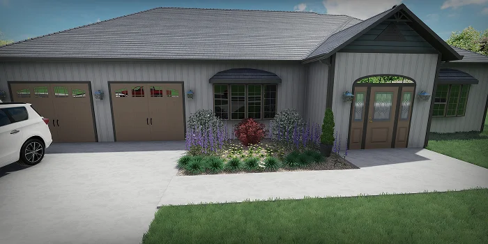 Front yard landscaping with flowers, shrubs, and driveway illustrating landscape design cost considerations by Carrington Lawn & Landscape in WI