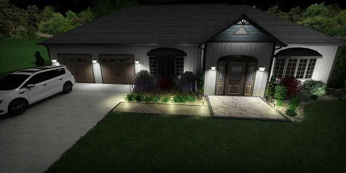 Nighttime front yard landscape with entryway lighting and plant beds conveying cost illustration by Carrington Lawn & Landscape in WI