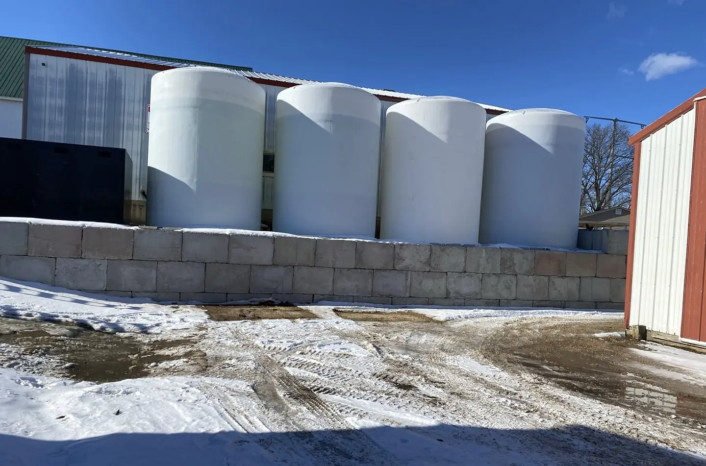 Multiple large brine tanks for salt enhanced deicers in Madison, WI